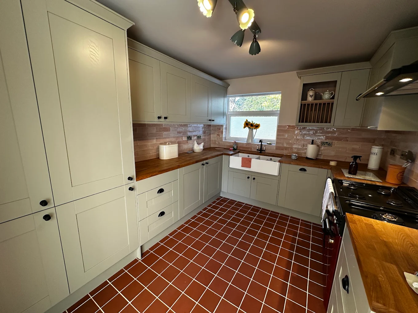 Shaker kitchen renovation with oak worktops completed by CIN Construction in Rugby