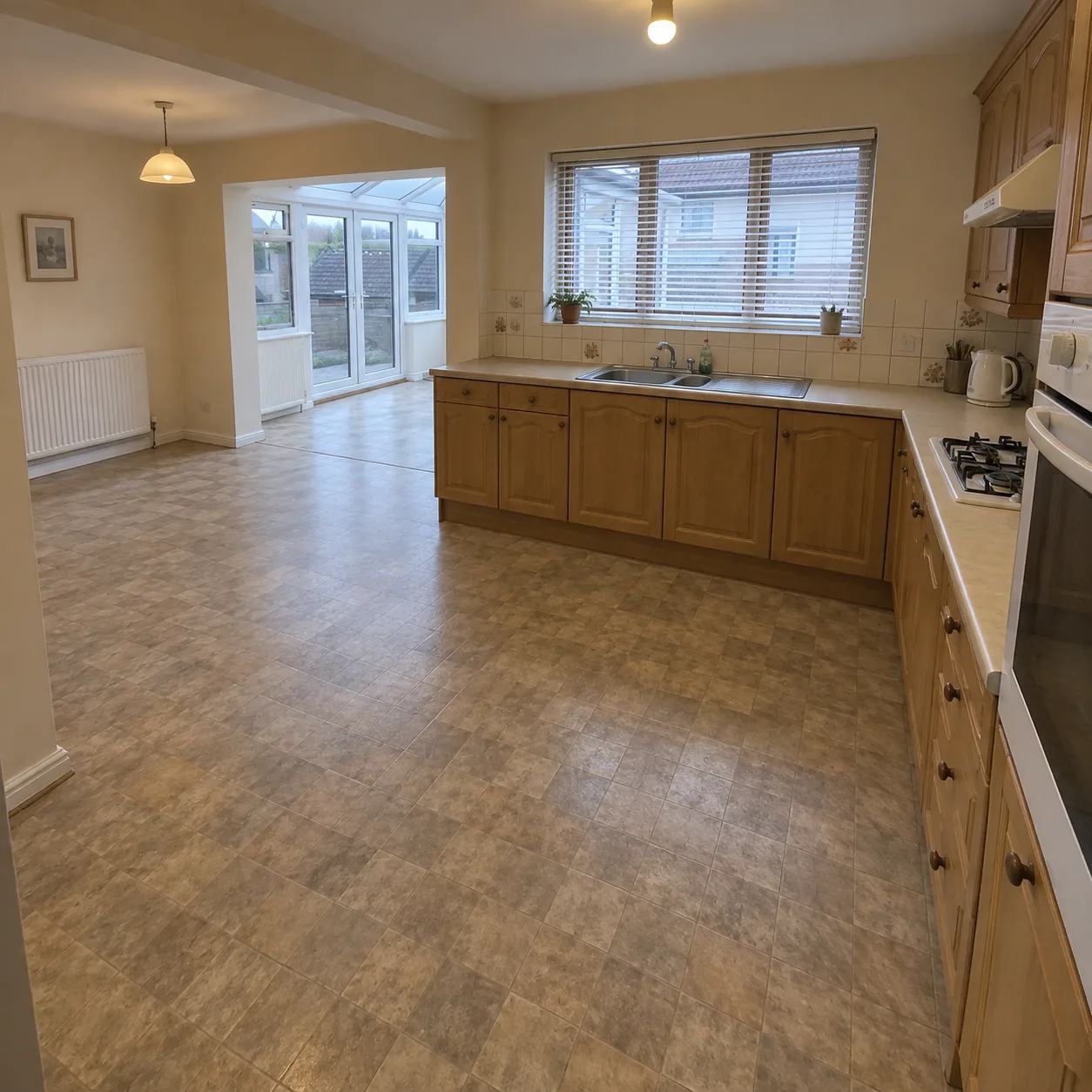 Before: illustrative image of a dated kitchen prior to renovation